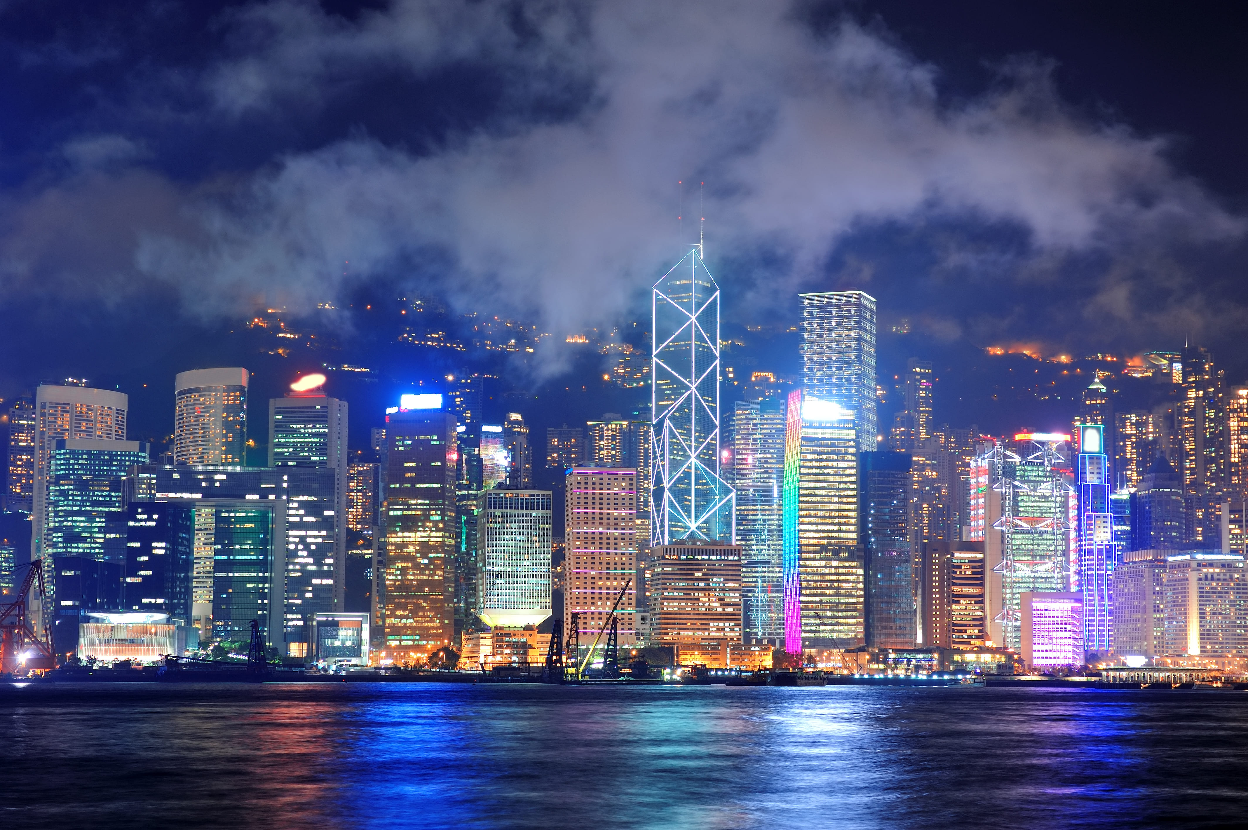 Hong Kong skyline viewed from Victoria Harbour at dusk